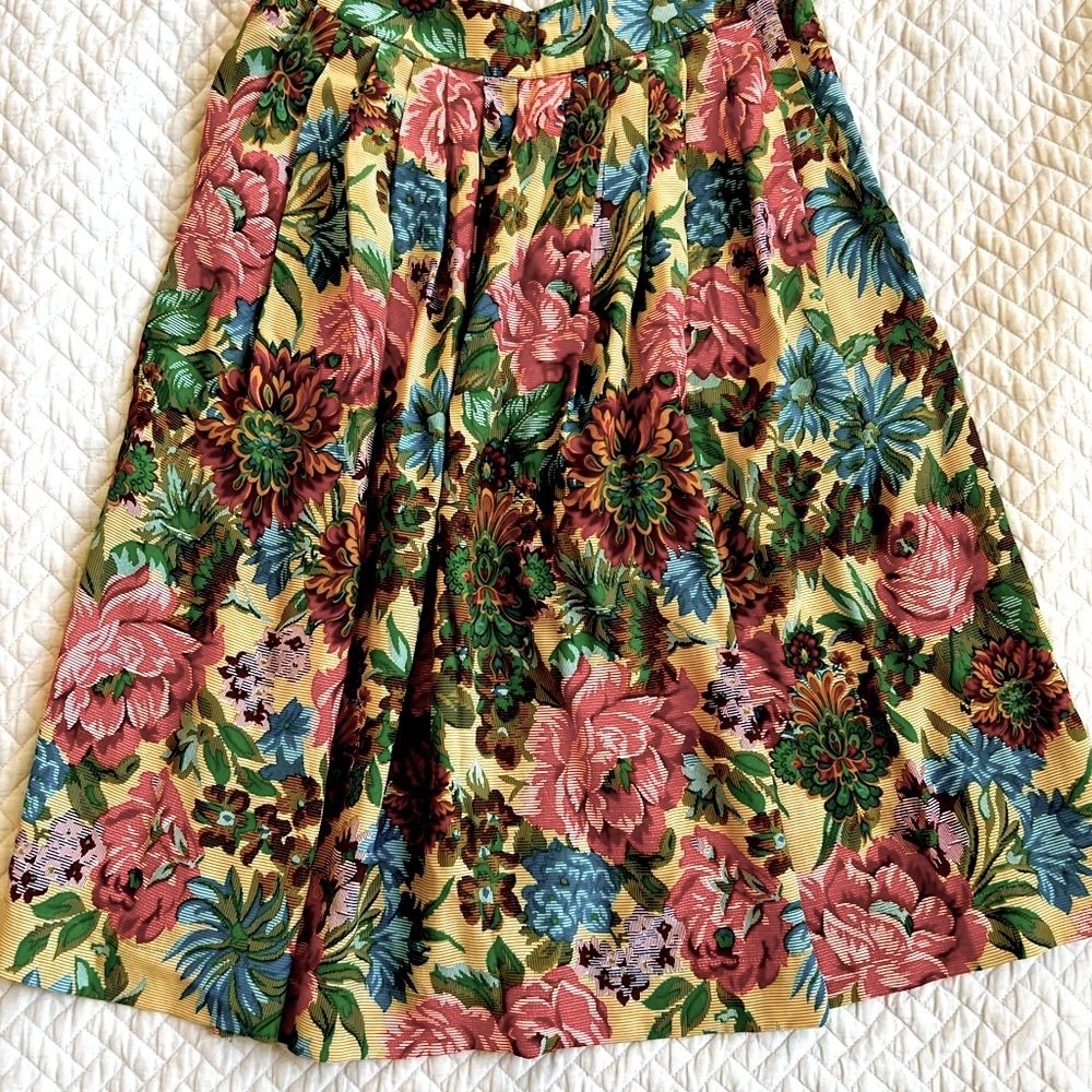 Silk Floral Pleated Skirt with Side Zipper and Deep Pockets.